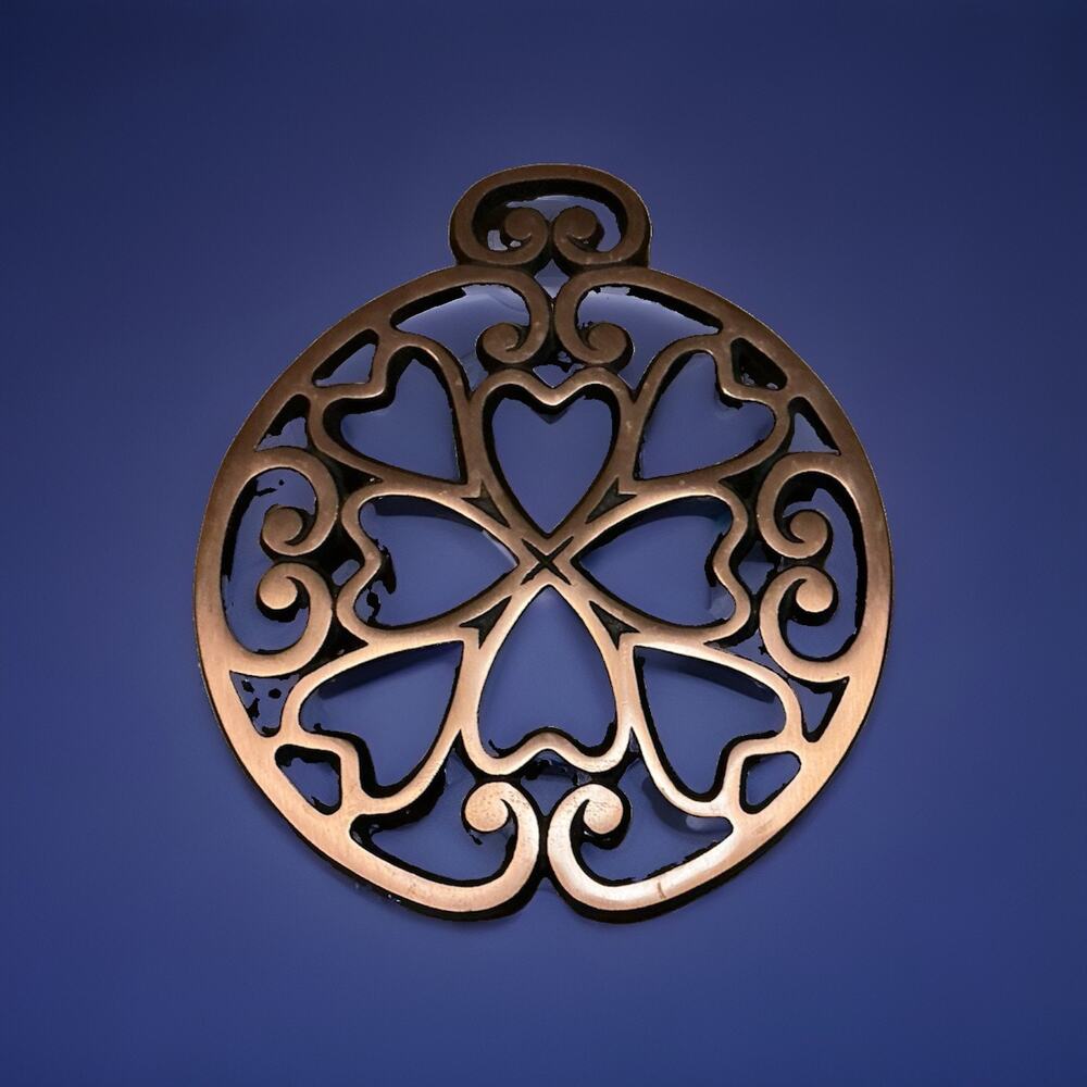 VTG PAMPERED CHEF CAST IRON TRIVET COPPER TONE ROUND UP FROM THE HEART 7"